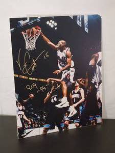 lot 59 image: Autographed Photo by HOF Toronto Raptors Great Vince Carter No COA