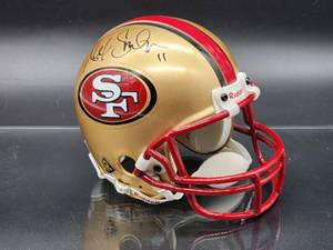 lot 106 image: Autographed Mini Helmet by San Francisco 49er Quarterback Great Alex Smith No COA