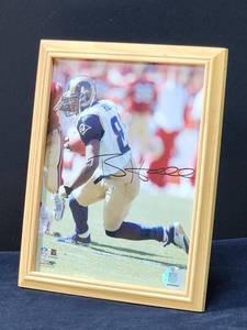 lot 81 image: Autographed Photo by St. Louis Rams Great Torry Holt No COA