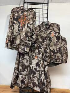 lot 61-K2025 image: Used Mens XL Nomad Camo Hunting Wear  Moisture-Wicking Hoodie, Vest, and Soft Shell Jacket (Three-Piece Set) - Good Condition