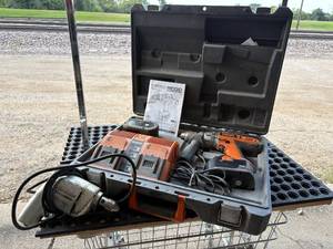 lot 77-K2025 image: Wireless 14.4V 12 Inch Drill Driver (Two-Pack) by Rigid  Vintage Sunbeam Drill Master Electric Drill (seller states both batteries are in good condition)