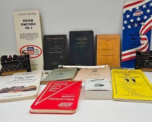 lot 23 image: Group of Obsolete Railroad Timetables & Bookends