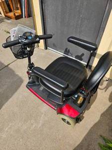 lot 48 image: Elite Traveller Mobility Scooter by GO-GO