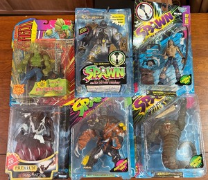 lot 61 image: Vintage Action Figures NIB Spawn, TMNT etc