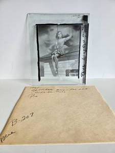 lot 115 image: Original Pre-Production Glass Panel Pinup - Girl On Roof