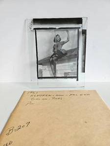lot 113 image: Original Vintage Pre-Production Glass Panel Plate Pinup Girl on Roof