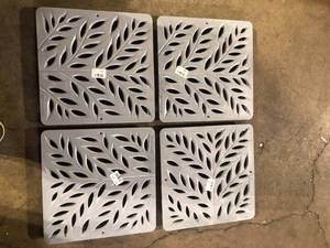 lot 64 image: Lot of 12 in. Square Catch Basin Drain Grate, Decorative Botanical Design, Gray Plastic by NDS  Customer Returns See Pictures