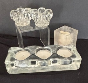 lot 125 image: Three Crystal and Clear Glass Candle Holders
