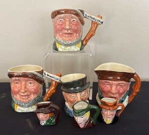 lot 133 image: Collection of Petite Toby Mugs  Character Mugs including Uncle Tom Cobleigh, Mr. Micawber, Highway Man and More