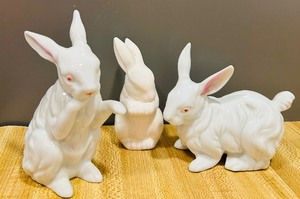lot 94 image: Adorable White Rabbit Figurines