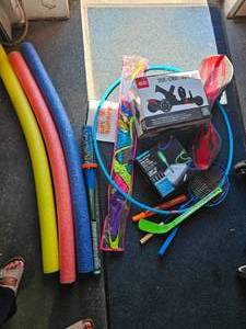 lot 27 image: Lot Of Toys Rip Stick, Cardiff Skates, Large Kite, Bubbles, Bat, Knee Hockey, More