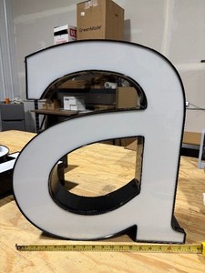 lot 27 image: White Front Lit Channel Letter A Illuminated Sinage