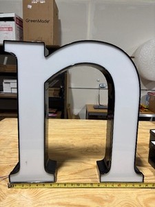 lot 29 image: White Front Lit Channel Letter N Illuminated Sinage