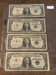 lot 68 image: 1957 Blue Seal $1 Dollar Silver Certificates