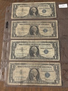 lot 70 image: 1957 Blue Seal $1 Dollar Silver Certificates