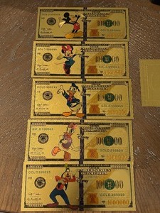 lot 74 image: 24K Gold Walt Disney $100 Dollar Notes