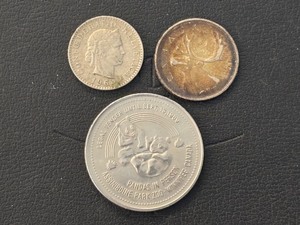 lot 60 image: Winnipeg Trade Dollar and Other Silver Coins