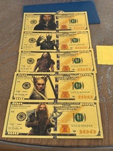 lot 19 image: 24K Gold Lord of the Rings $100 Dollar Notes