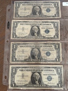 lot 20 image: 1957 Blue Seal $1 Dollar Silver Certificates