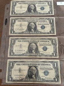 lot 22 image: 1957 Blue Seal $1 Dollar Silver Certificates
