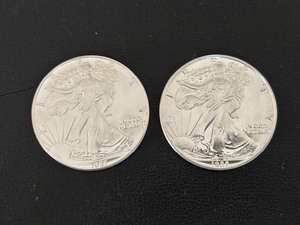 lot 27 image: 1987 & 1988 Silver Eagles