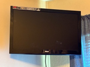 lot 23 image: RCA 24 LED LCD TV
