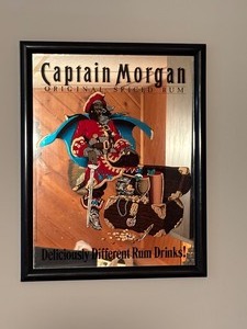 lot 34 image: Captain Morgan Mirrored Wall Hanging