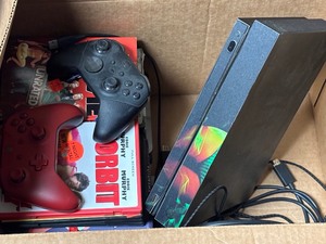 lot 156 image: Xbox One System and Movies
