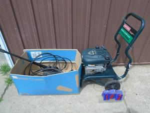 Craftsman 2300 psi pressure washer with misc hose & wands. Powers up & run. Didn't test further. As shown.