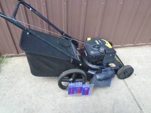 lot 107 image: Brute 6.5 hp push mower. High wheel. Tested & works. As shown.