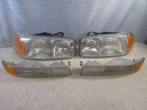 lot 40 image: (A-1) GMC Head Lights...