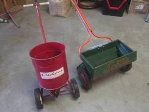 lot 48 image: (BR2) 2 Vintage Metal Seed Spreader...