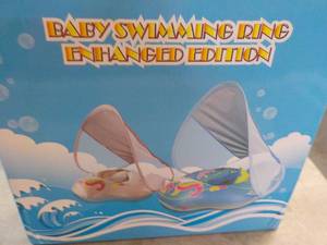 lot 302 image: Baby Swimming Ring...