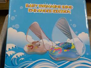 lot 308 image: Baby Swimming Ring...