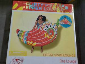 lot 310 image: Flirty Fiesta Pepper Lounge...