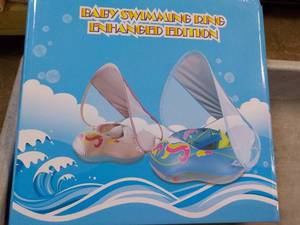 lot 312 image: Baby Swimming Ring...