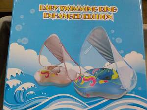 lot 322 image: Baby Swimming Ring...