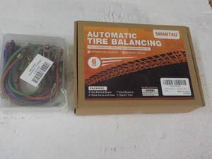 lot 195 image: Automotive Tire Balancing and Small...