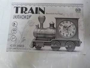 lot 104 image: Train Clock...