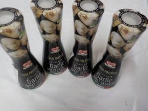 lot 105 image: 4 Cold Pressed Italian Garlic Spray...