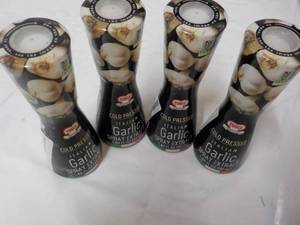 lot 106 image: 4 Cold Pressed Italian Garlic Spray...