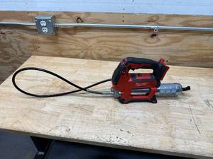 lot 31 image: Milwaukee M18 18V Lithium-Ion Cordless Grease Gun 2-Speed (Tool-Only)
