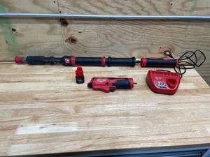 lot 86 image: Milwaukee TrapSnake 4 Urinal Auger with 2 Trap Snake Drivers, Battery and Charger