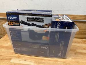 lot 54 image: Oster Lot of 4 - Titanium-Infused DuraCeramic Flip Waffle Maker