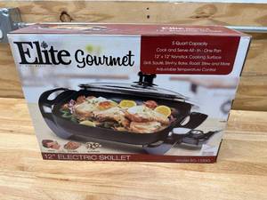 lot 56 image: Elite Cuisine EG-1220G 12-Inch Non-Stick Electric Skillet with Glass Lid