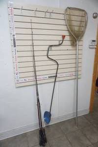 lot 40 image: Fishing Rods, hand crank ice auger & fishing net