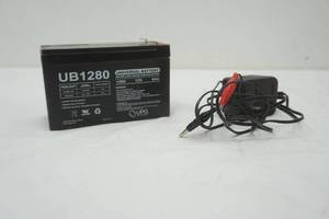 lot 184 image: UB1280 Battery and Charger