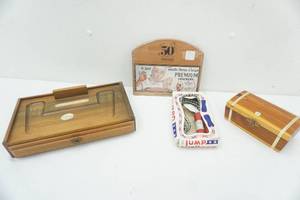 lot 279 image: Vintage Items-small cedar box, vintage jump rope still in package