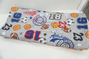 lot 335 image: NEW Reversible Twin Bed Comforter, Sports Themed