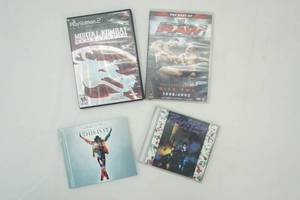 lot 368 image: Michael Jacksons This is It CD, PS2 Games RAW & Mortal Kombat
